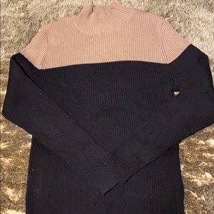 Black and brown turtleneck sweater
